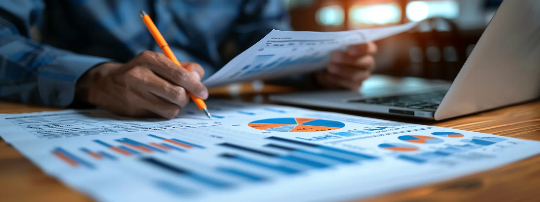 a focused and confident fractional cfo reviewing financial reports at a sleek modern office desk, analyzing data to enhance business growth strategies.