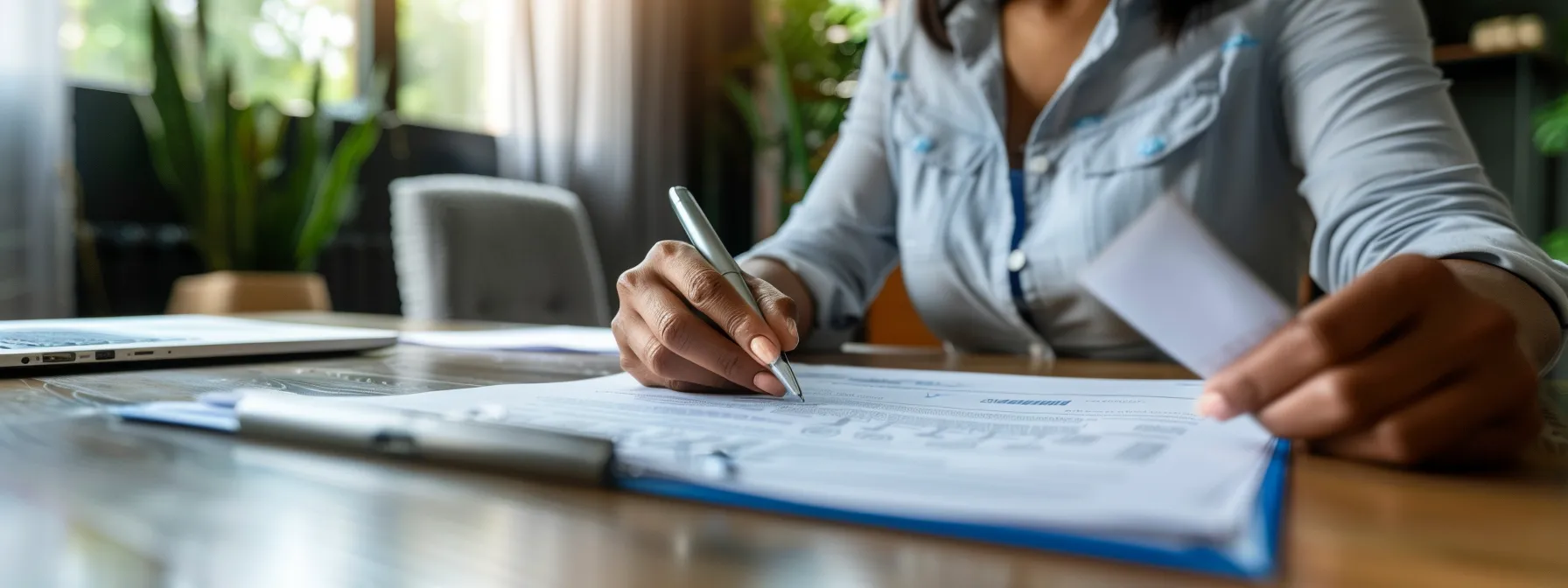 a focused individual reviewing resumes of potential fractional cfo candidates in a modern office setting.