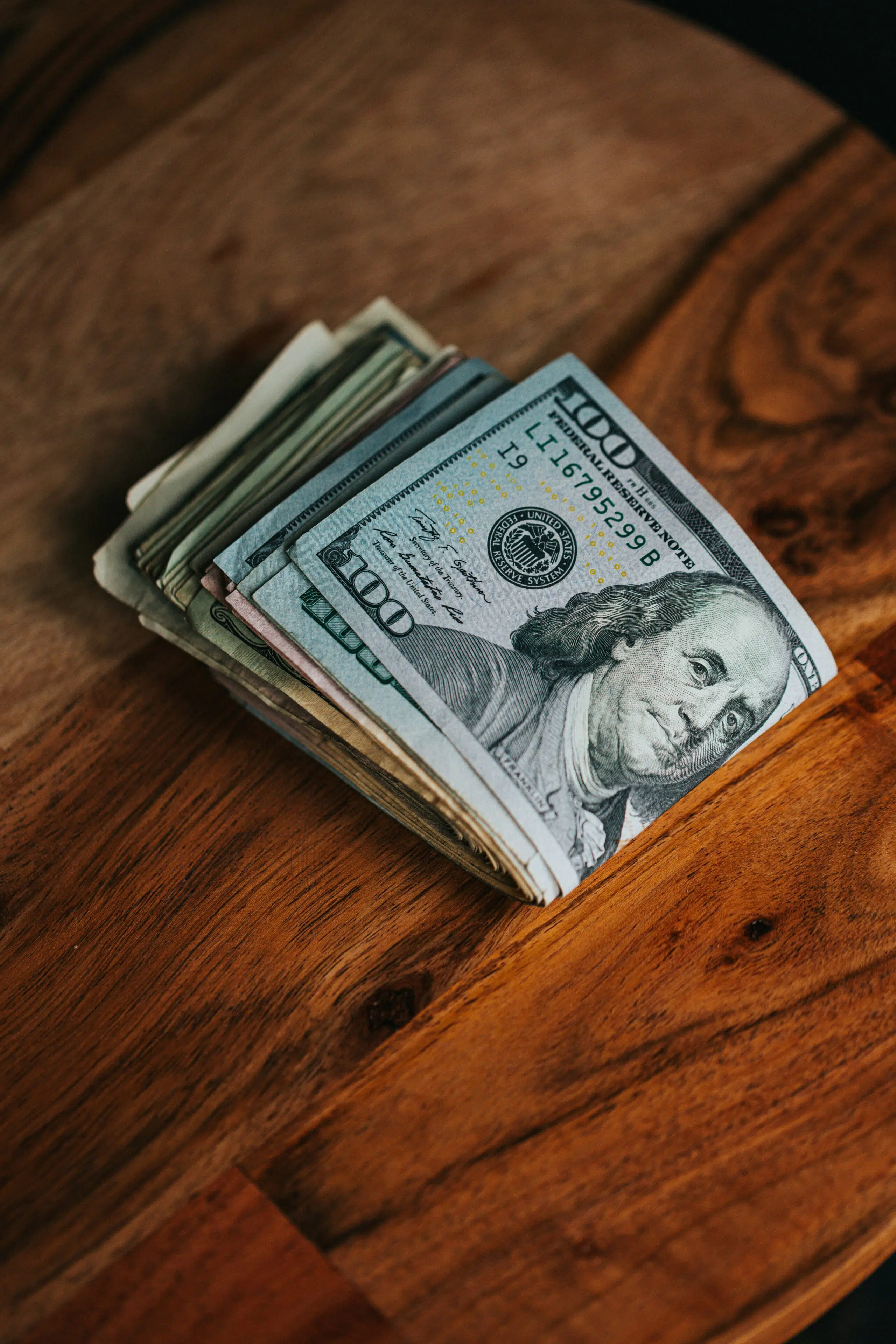 a stack of cash | Cohesion a stack of cash