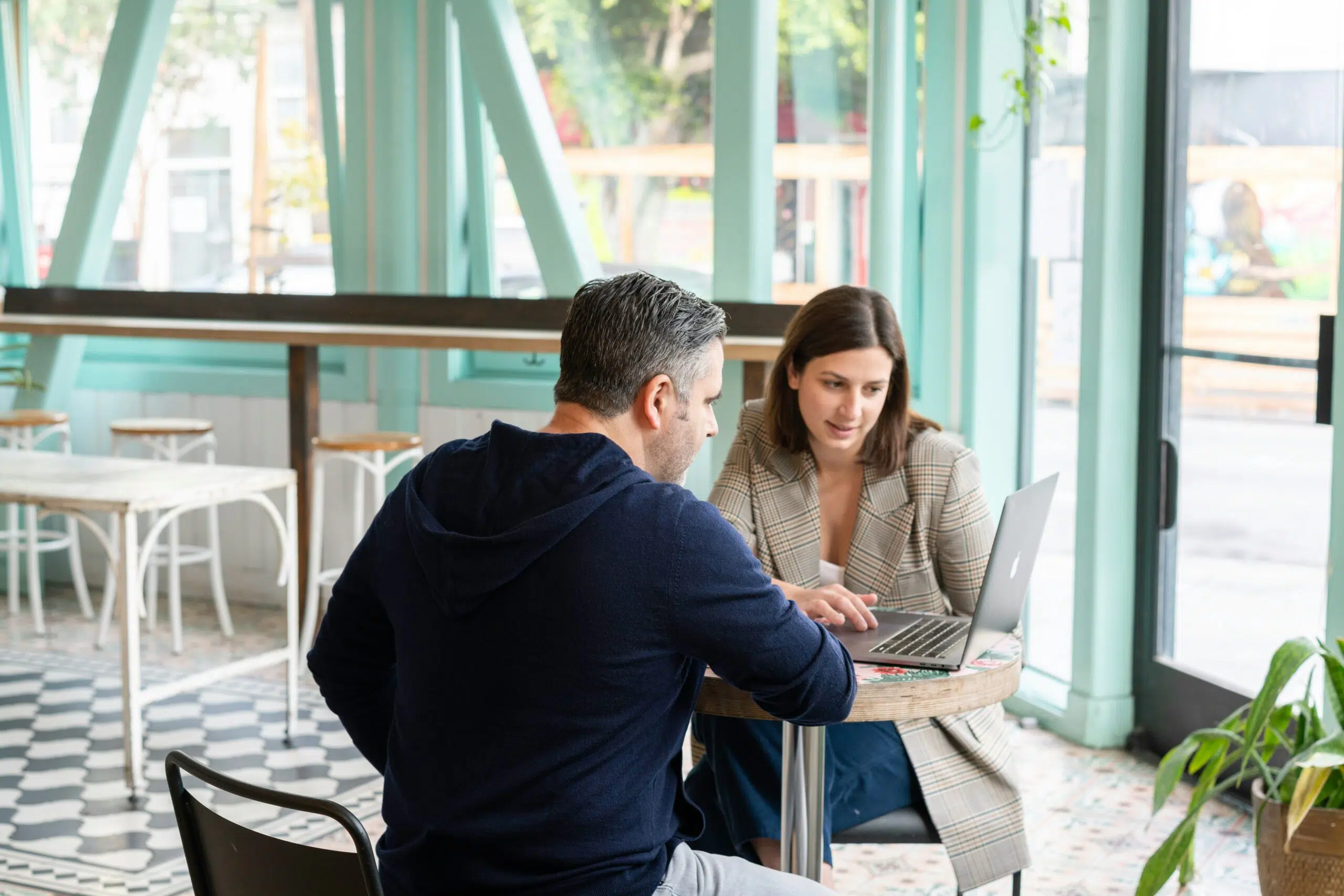 two people discussing business matters