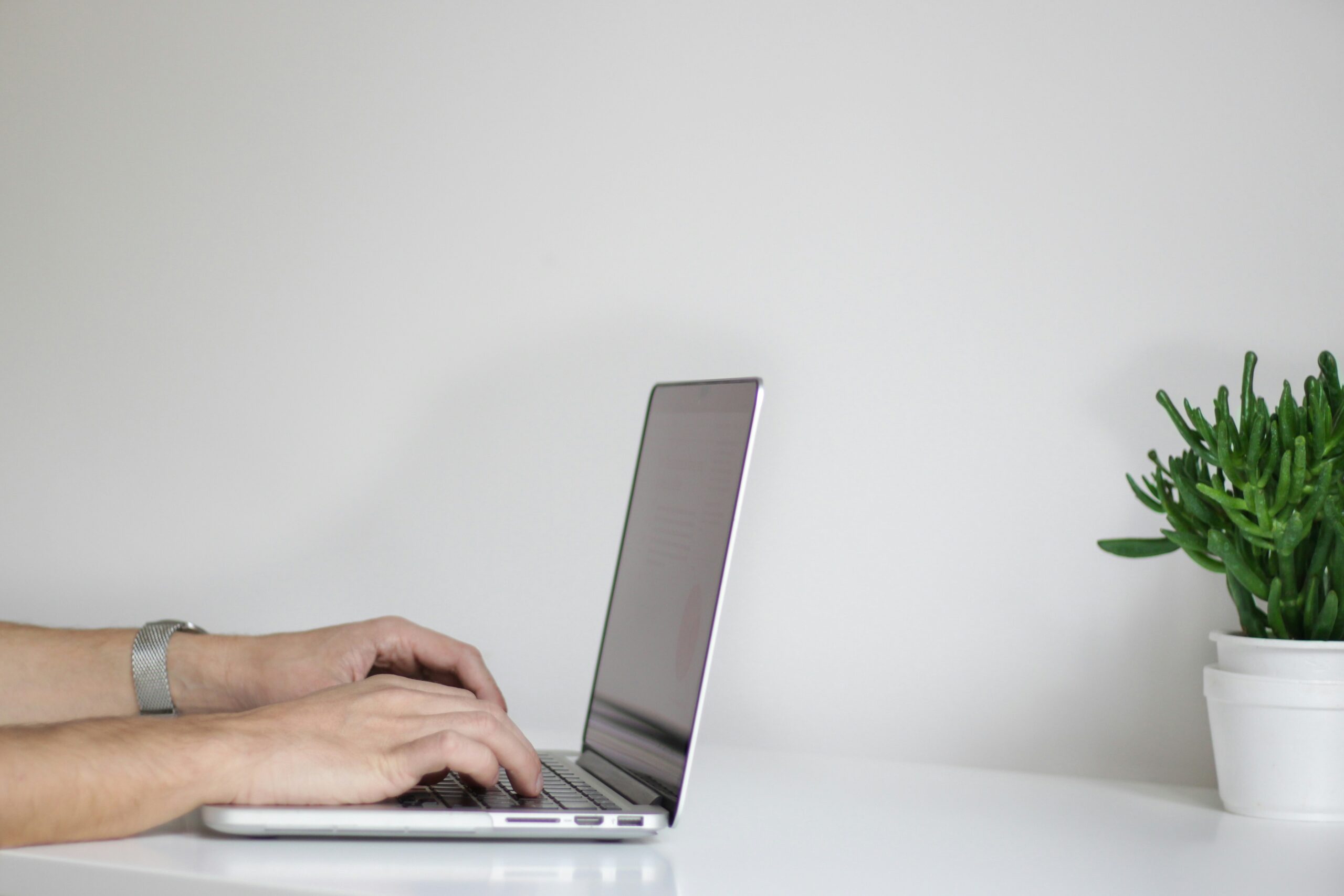 a person working on a laptop | Cohesion a person working on a laptop