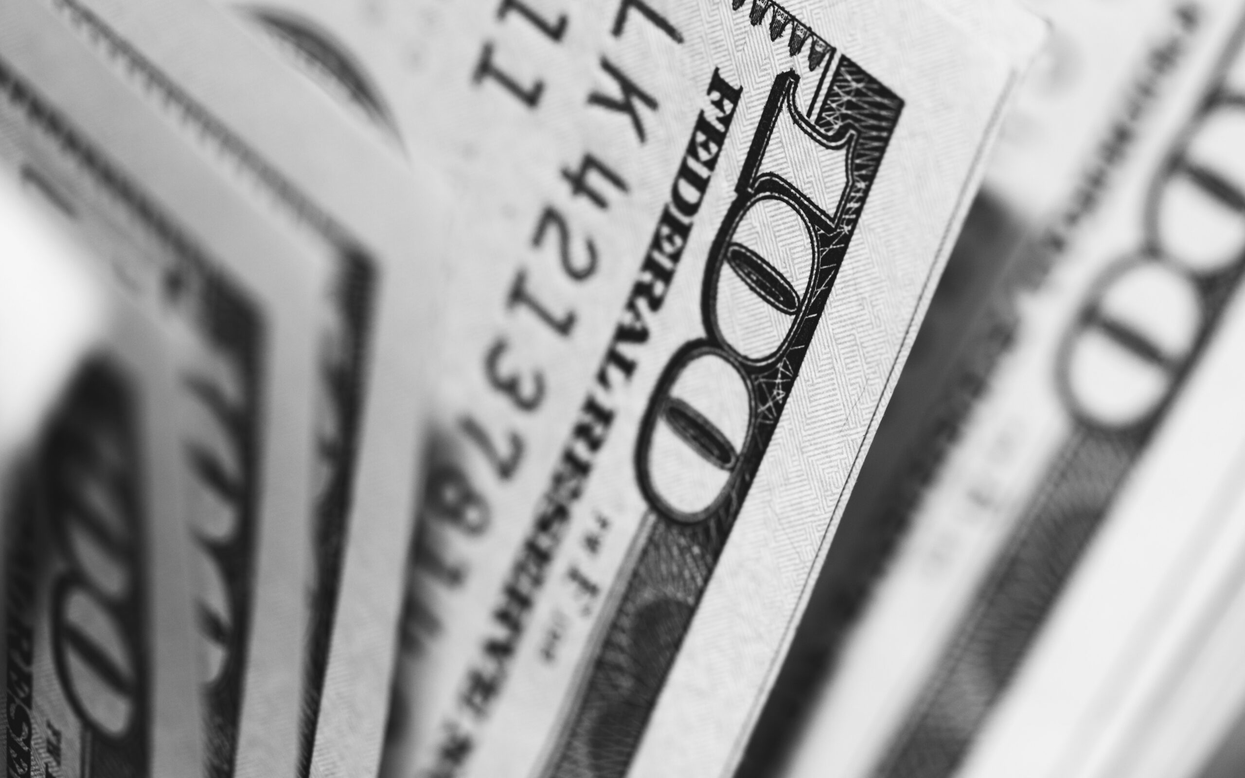 a stack of cash | Cohesion a stack of cash