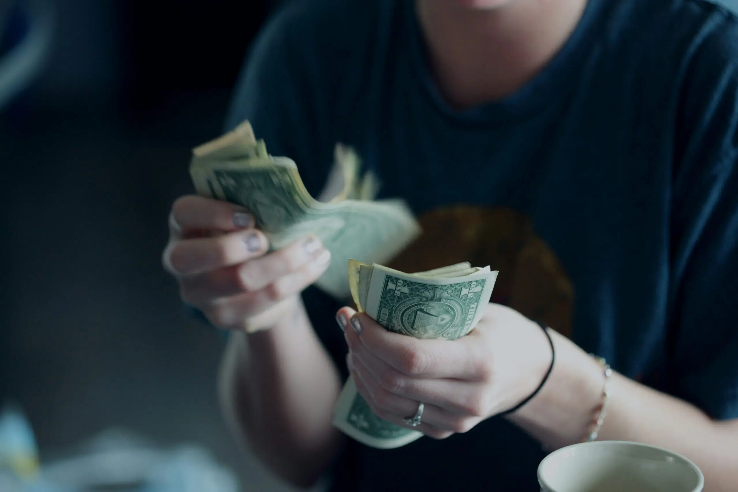 a woman counting cash