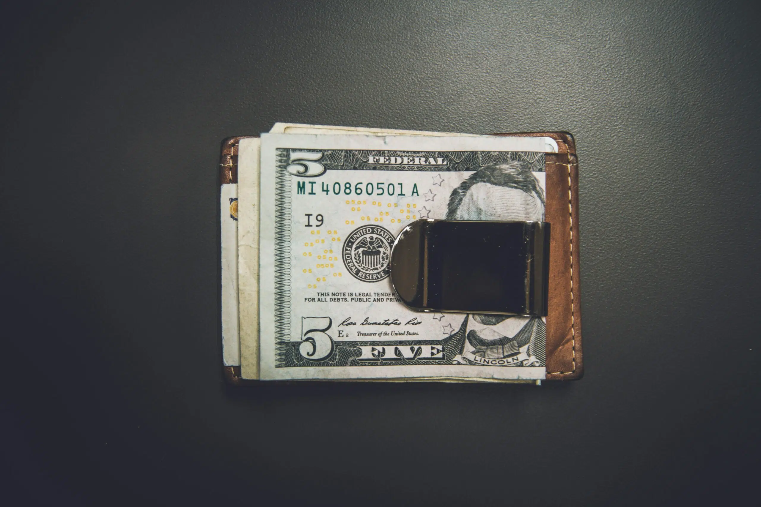 a stack of cash on a table