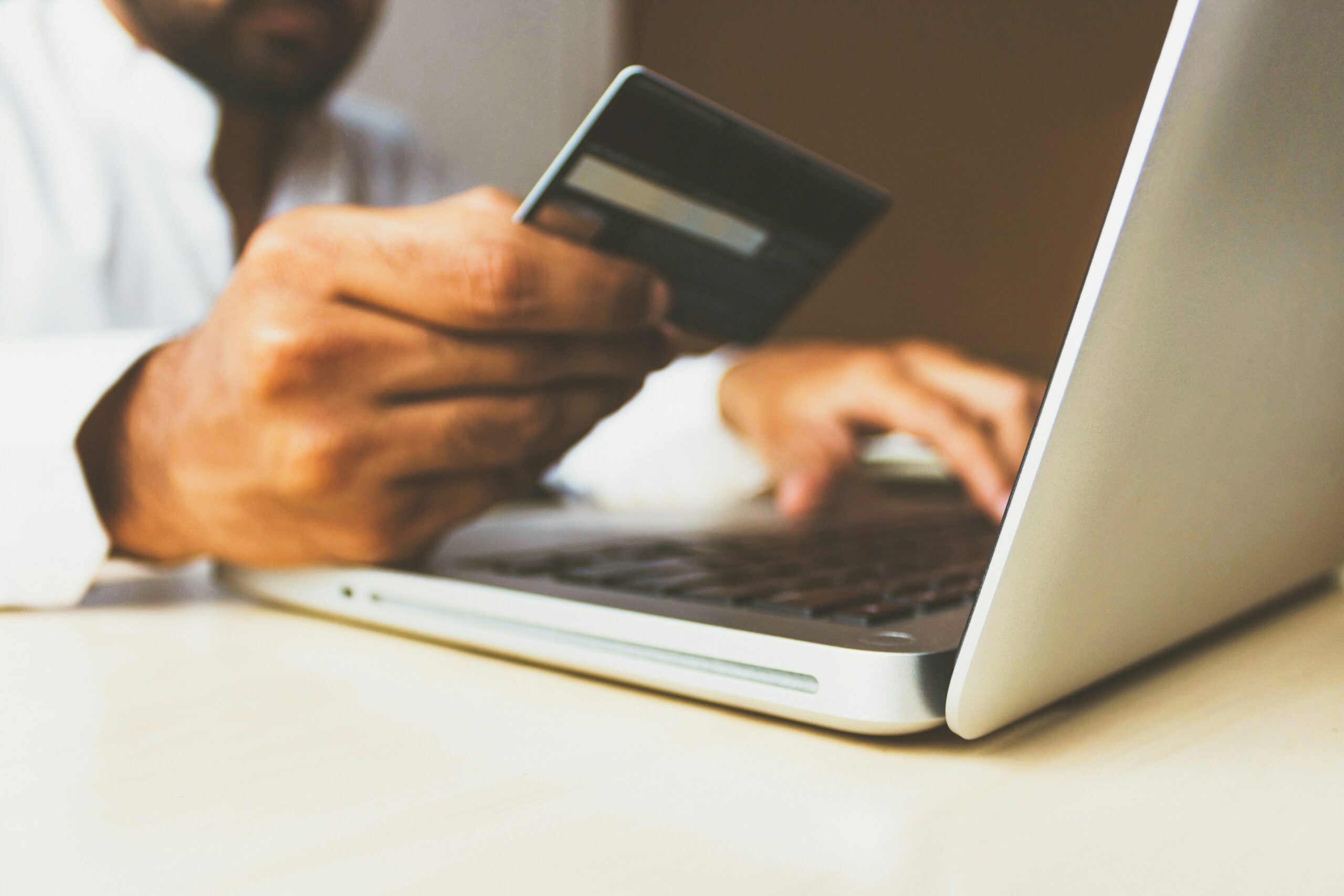 a person making an online payment | Cohesion a person making an online payment