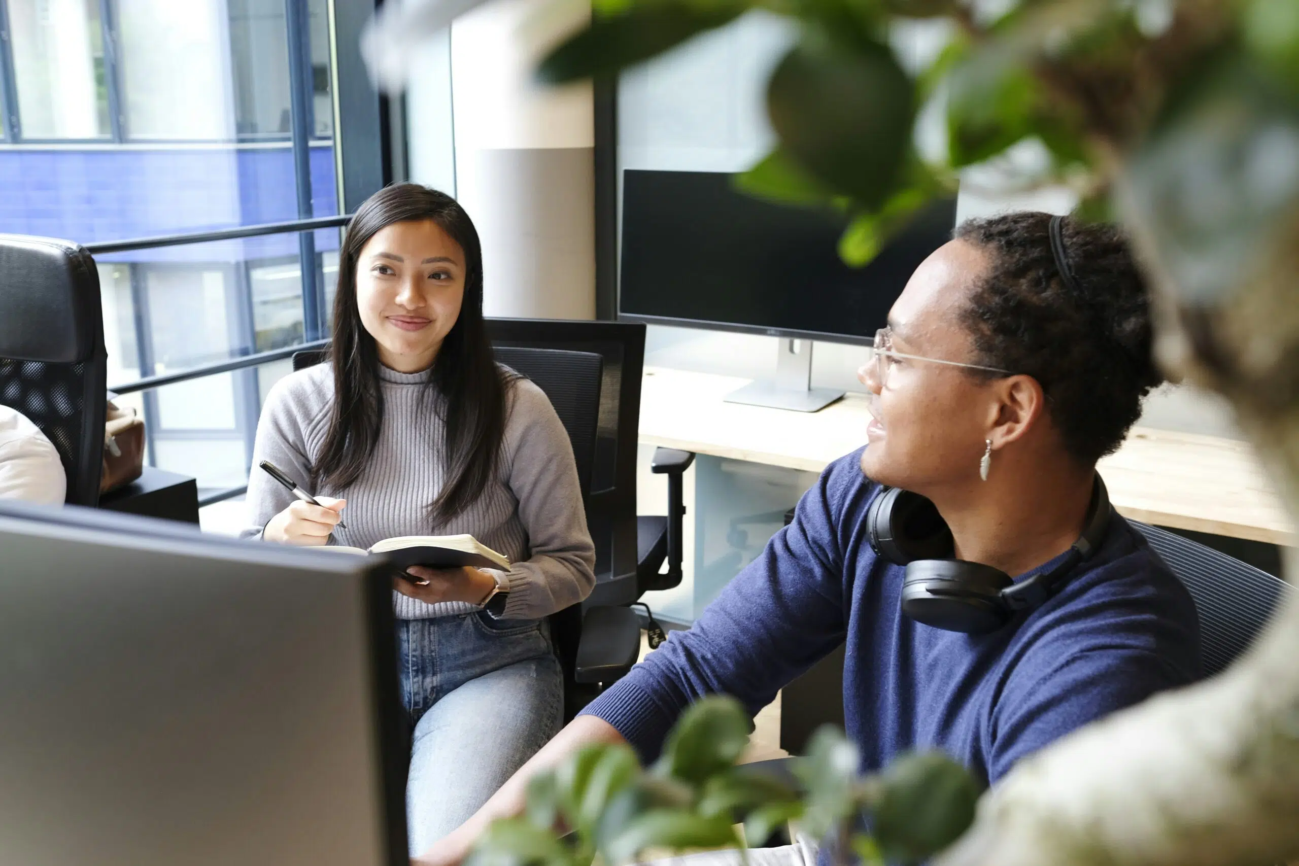 two financial experts in an office