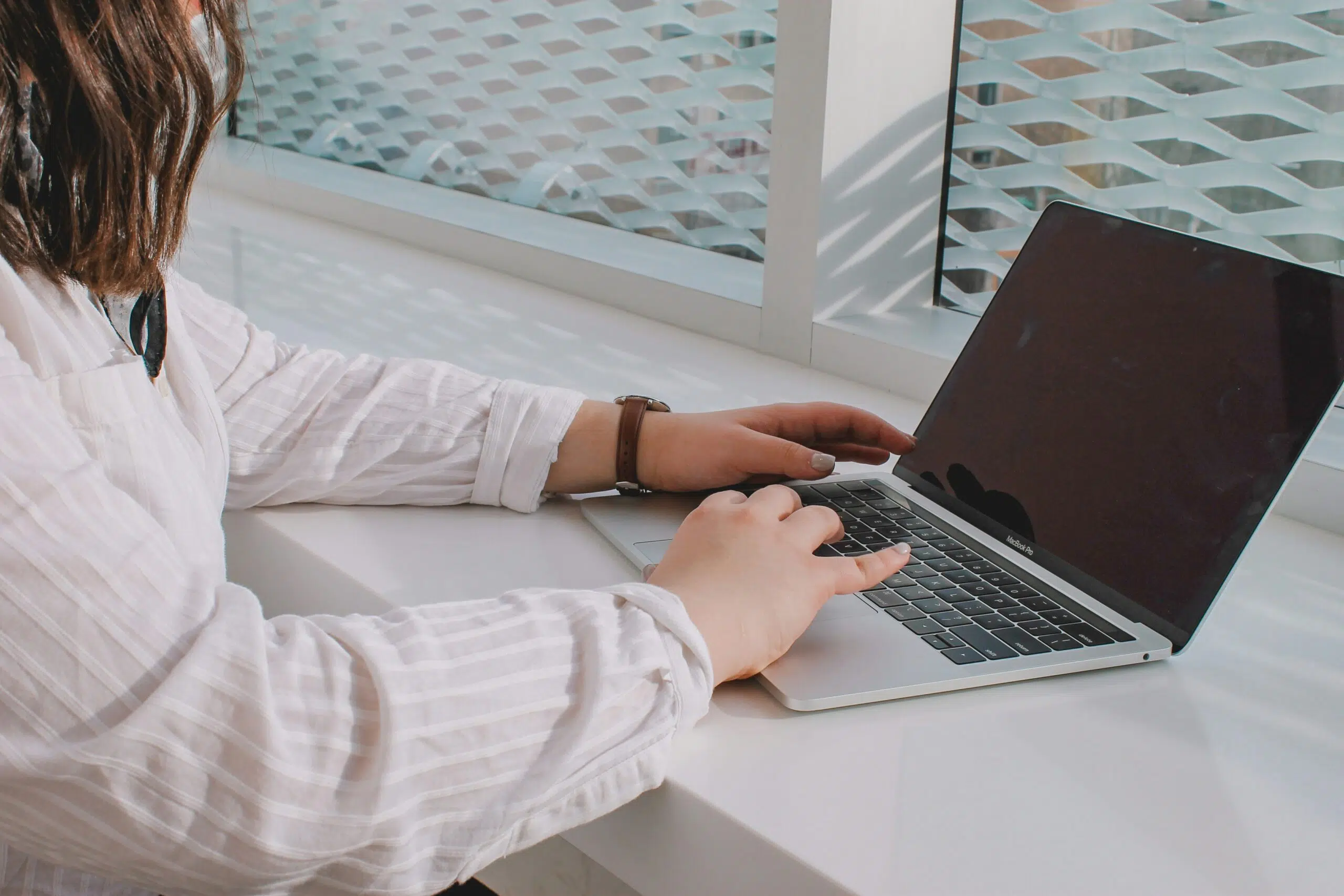 a woman working on a laptop