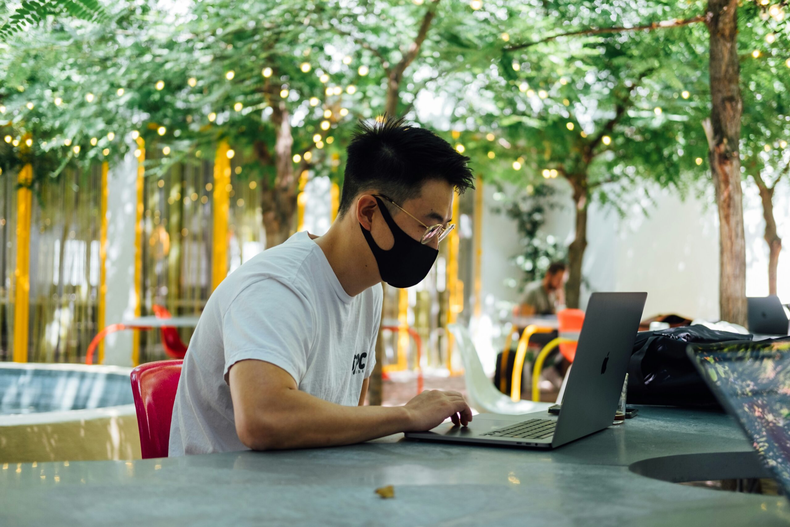 a person working on laptop | Cohesion a person working on laptop