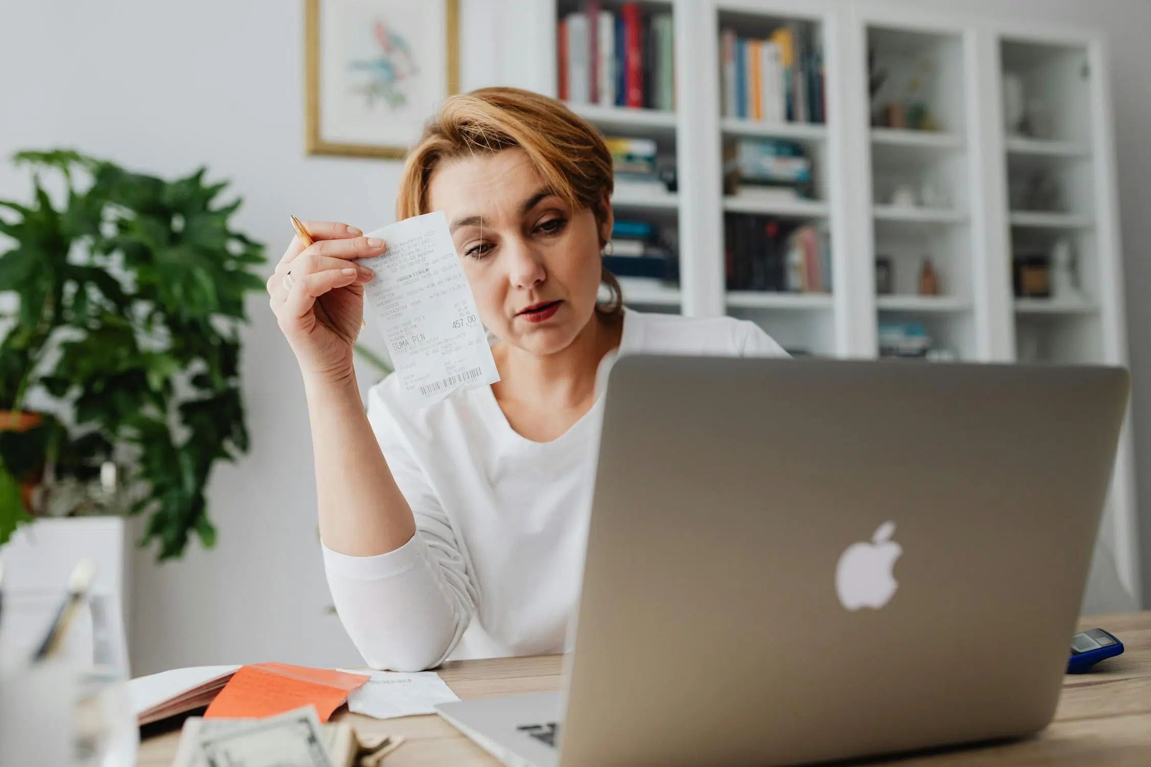 pexels photo 5900073.jpeg | Cohesion finance professional adding sales receipt in the accounting software