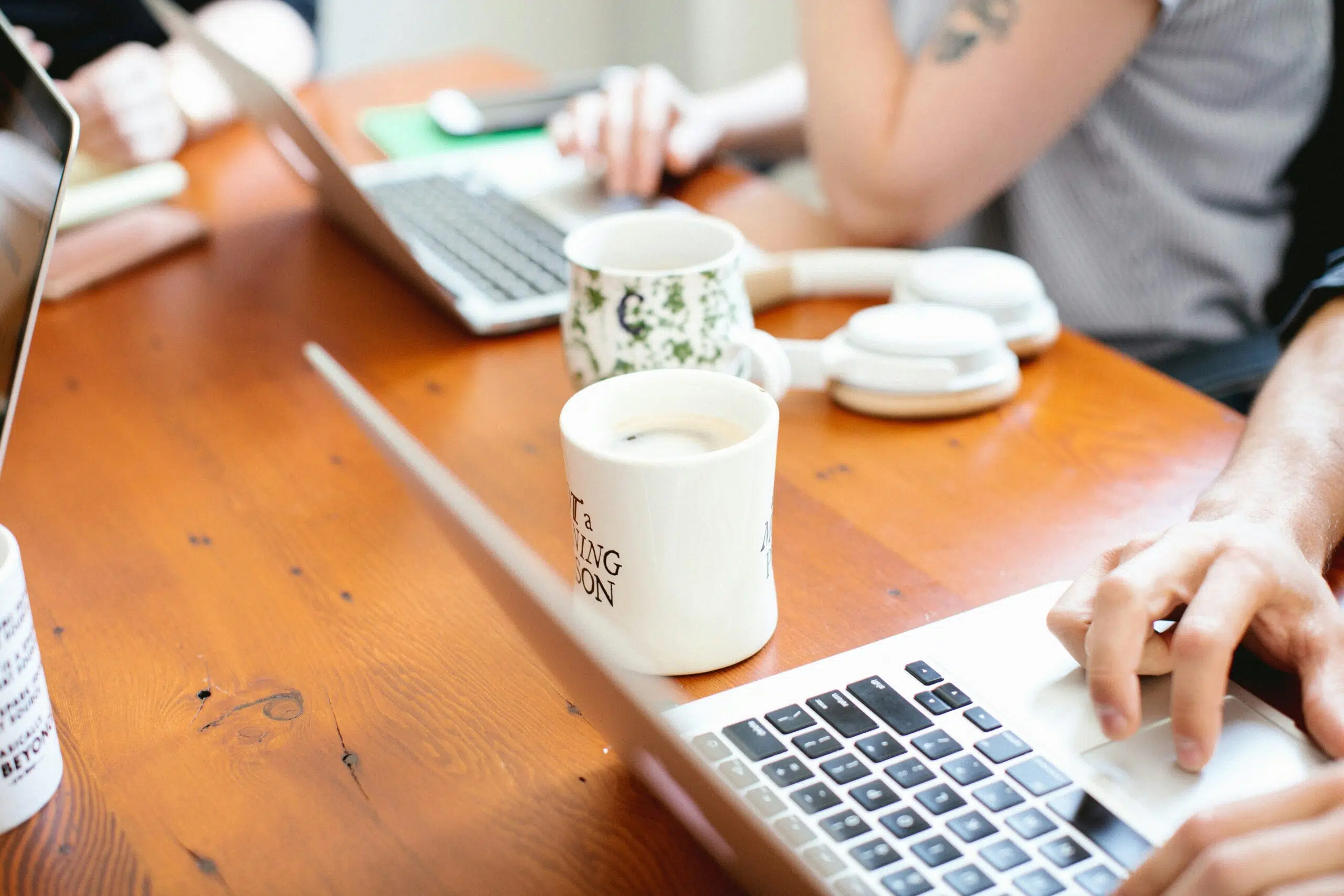 a person typing on a keyboard | Cohesion a person typing on a keyboard
