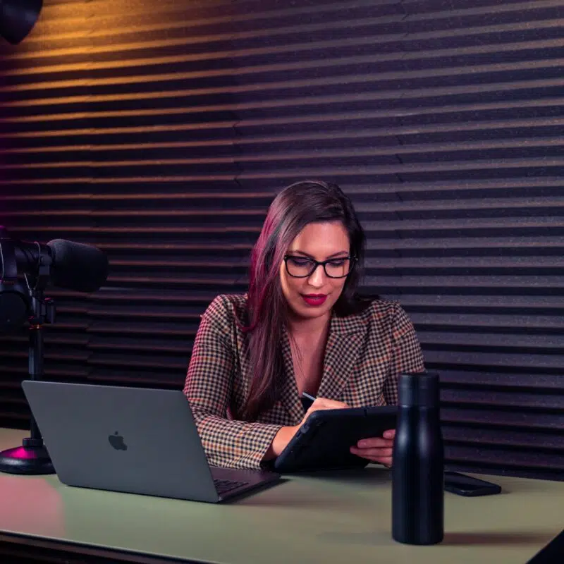 a woman working on her ipad