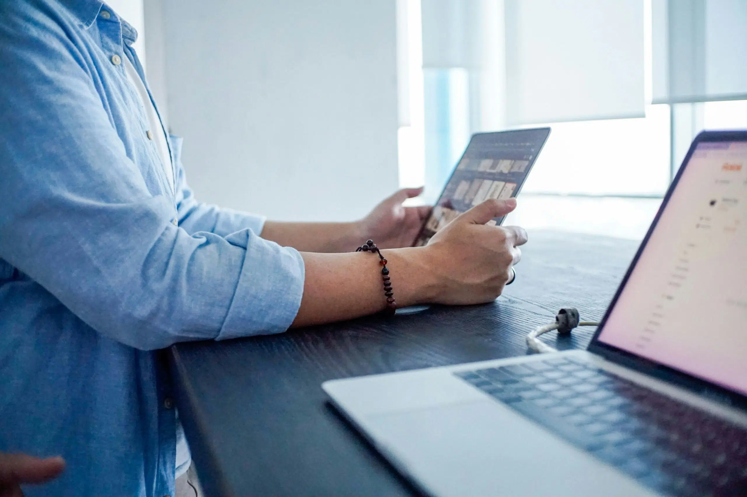 a person using their laptop | Cohesion a person using their laptop