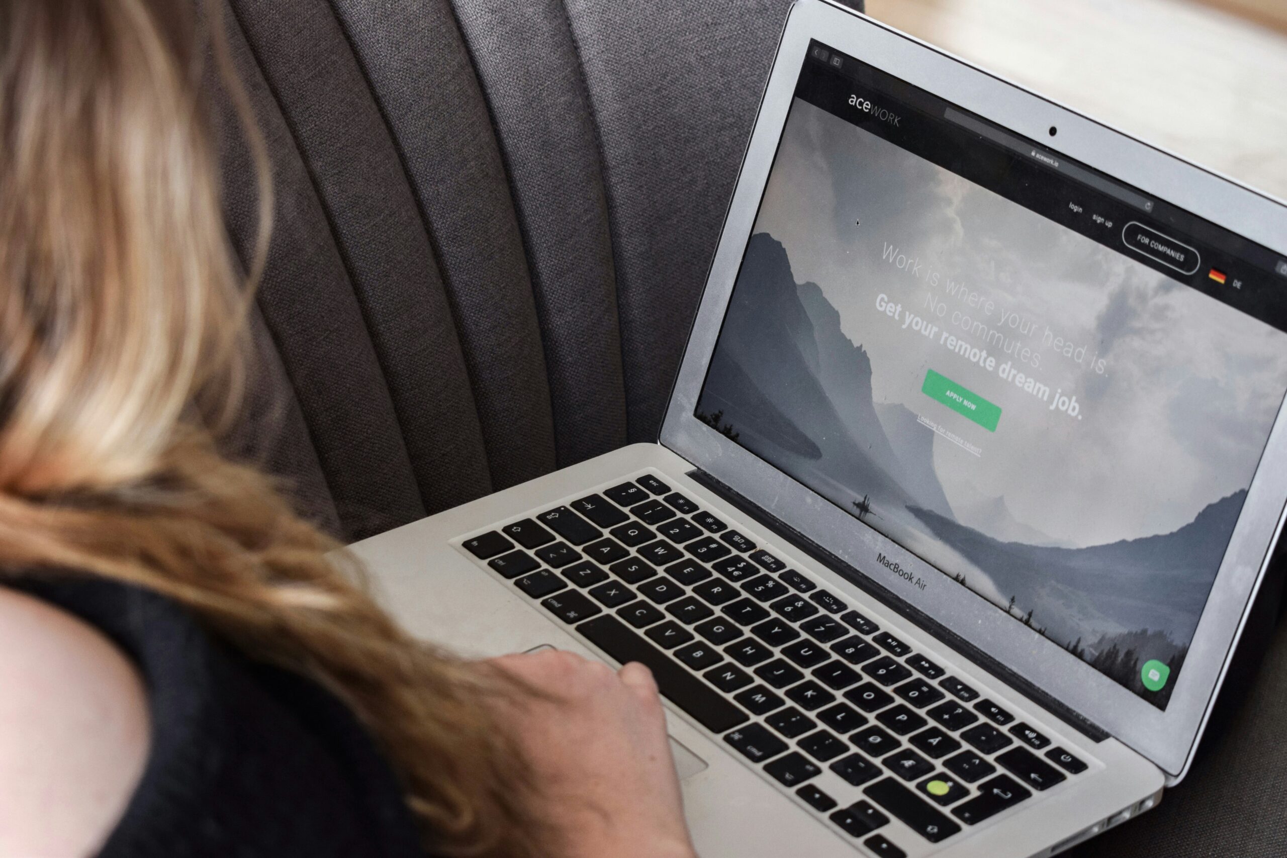 a woman using her laptop